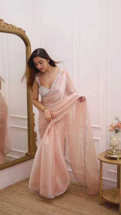 Pastel Peach Organza Saree with Silver Lace Border