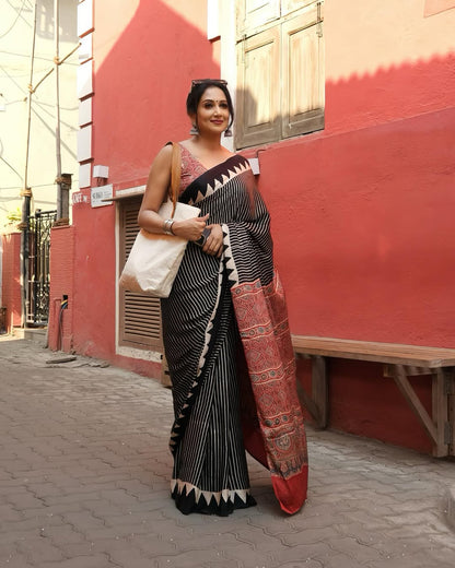 Trendy Black Striped Saree with Ajrakh Print Pallu – Festive & Party Wear