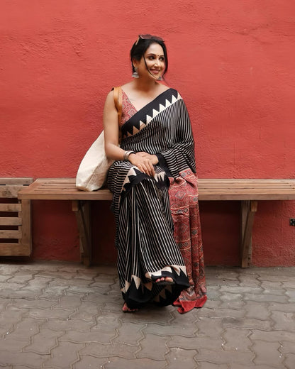 Trendy Black Striped Saree with Ajrakh Print Pallu – Festive & Party Wear