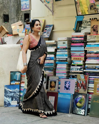 Trendy Black Striped Saree with Ajrakh Print Pallu – Festive & Party Wear